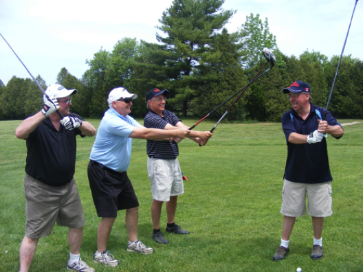 Dave Webb (Chepstow), Tom Schultz (Hanover), Steve Dentinger (Walkerton) and Tim Trushinski (Cargill) joined forces to demonstrate the multi-pupose nature of their drivers during the "Back for the Future" golf tourney for WDSS alumni at the Walkerton Golf and Curlng Club. The fun-loving foursome shot 39-35 on the par 36 course.